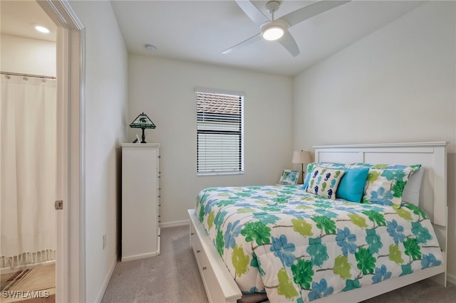 carpeted bedroom with ceiling fan