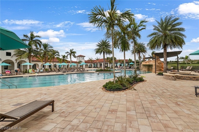 view of swimming pool with a patio area