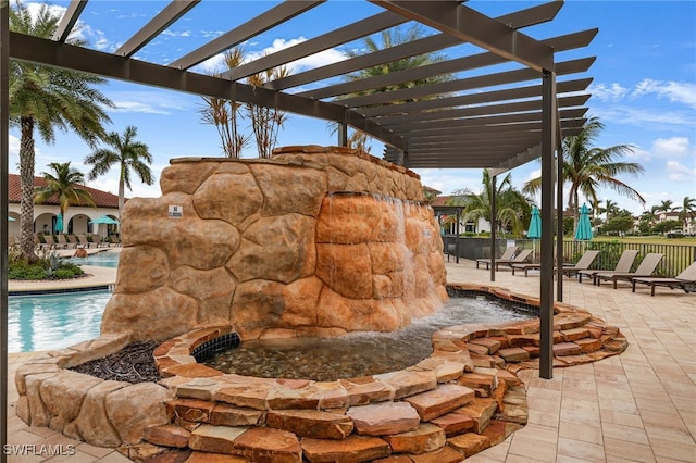 exterior space featuring a pool and a pergola