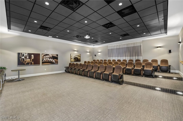 cinema featuring a paneled ceiling and carpet floors