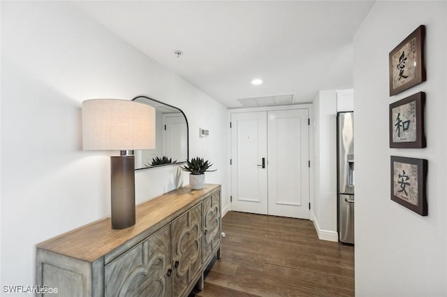 corridor with dark hardwood / wood-style floors