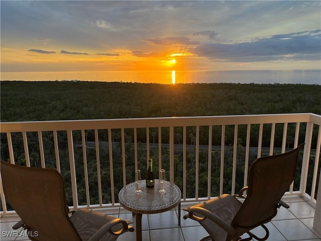 view of balcony at dusk