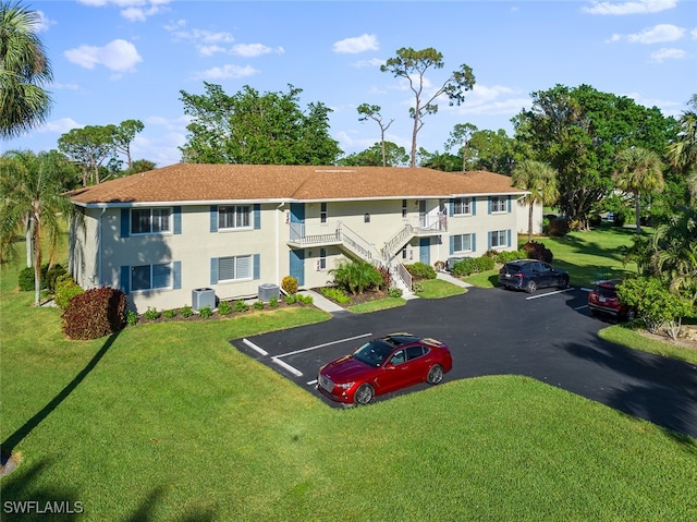 exterior space featuring central AC unit