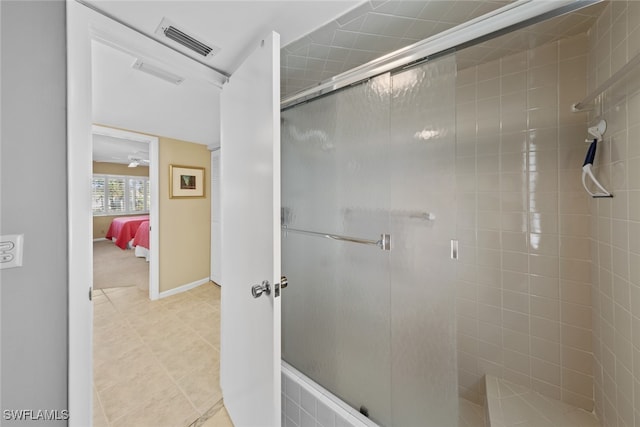 bathroom featuring tile patterned flooring and walk in shower