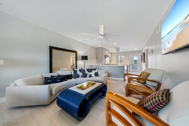 living room featuring ceiling fan