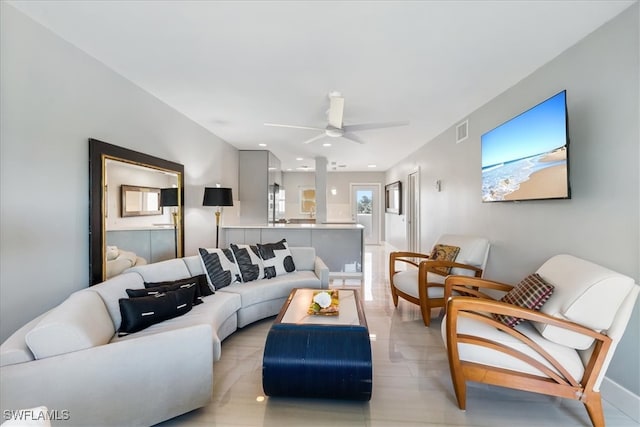 living room featuring ceiling fan