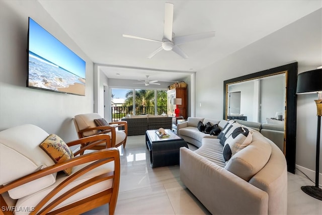 living room with ceiling fan and light tile patterned flooring