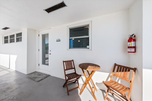 entrance to property with a patio area