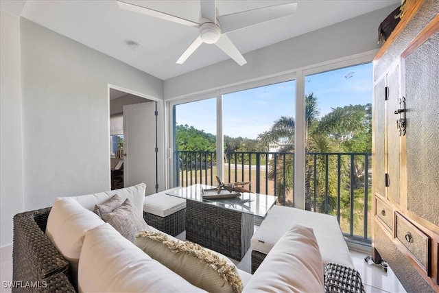 sunroom / solarium with ceiling fan