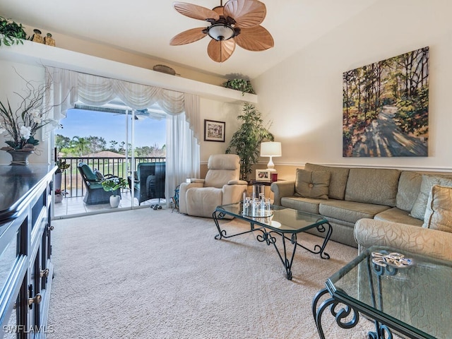 living room featuring carpet floors and ceiling fan