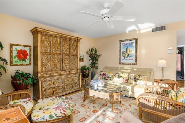 living room with ceiling fan