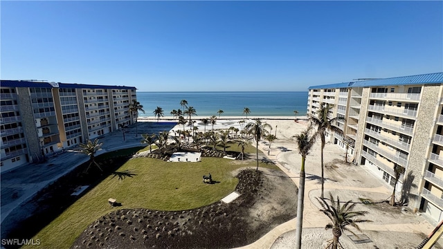 property view of water featuring a beach view