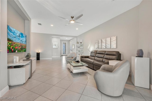 living room featuring ceiling fan and light tile patterned floors