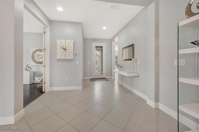 view of tiled foyer entrance