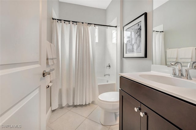 full bathroom with tile patterned flooring, vanity, toilet, and shower / tub combo