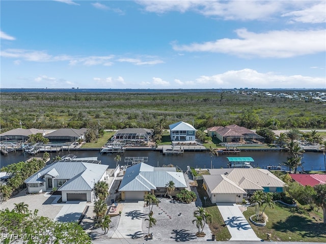 drone / aerial view featuring a water view