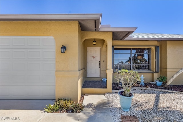 entrance to property with a garage