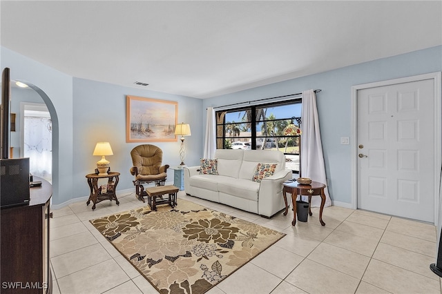 living room with light tile patterned floors