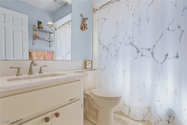 bathroom featuring walk in shower, vanity, and toilet