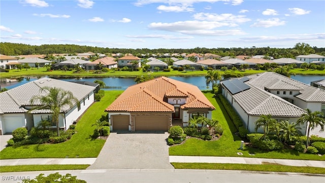 bird's eye view with a water view