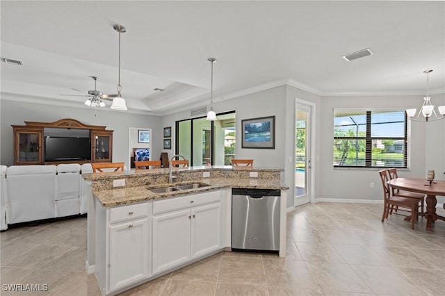 kitchen featuring sink, hanging light fixtures, stainless steel dishwasher, white cabinets, and ceiling fan with notable chandelier