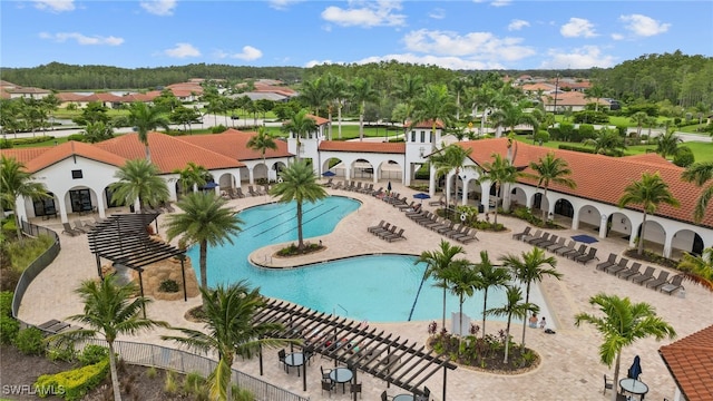 view of swimming pool with a patio