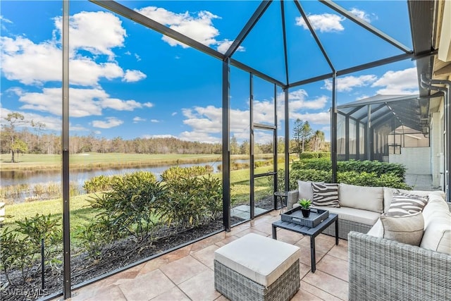 unfurnished sunroom featuring a water view