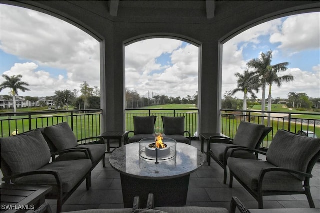 view of patio featuring a fire pit