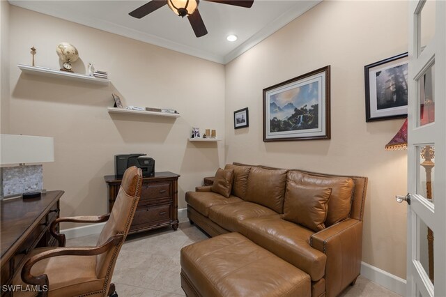 office area with ornamental molding and ceiling fan