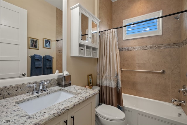 full bathroom featuring vanity, toilet, and shower / bath combo with shower curtain