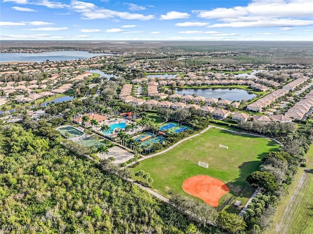 birds eye view of property featuring a water view