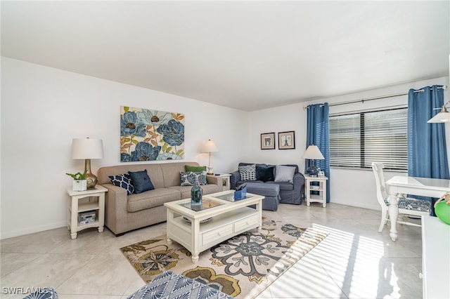 living room with light tile patterned flooring