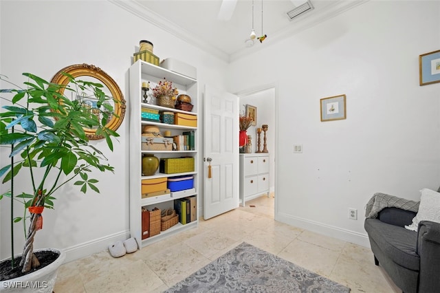 sitting room featuring crown molding and ceiling fan