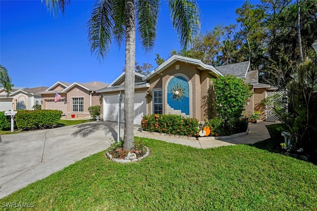 view of front facade featuring a garage and a front yard