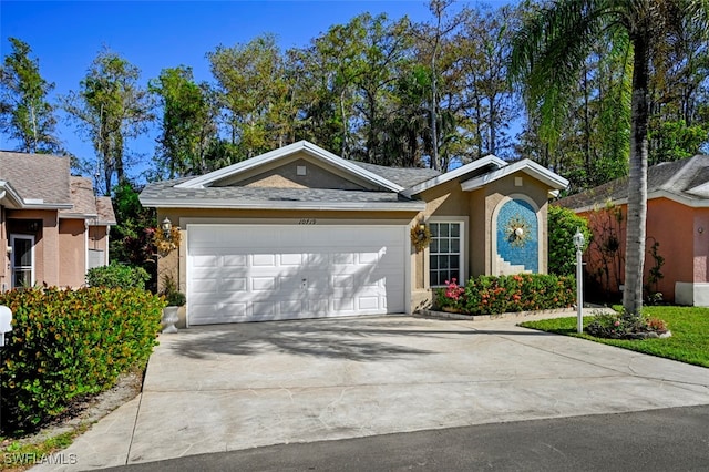 ranch-style home with a garage