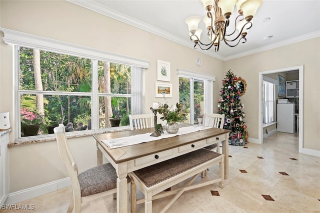 dining room featuring crown molding and a notable chandelier