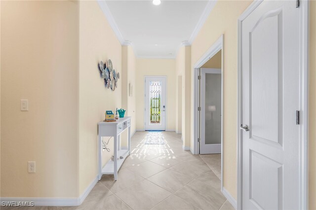 hallway featuring recessed lighting, light tile patterned flooring, crown molding, and baseboards