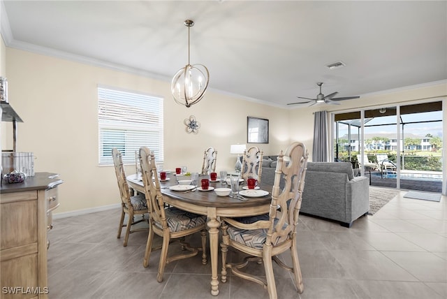 dining space with ornamental molding, light tile patterned flooring, visible vents, and baseboards