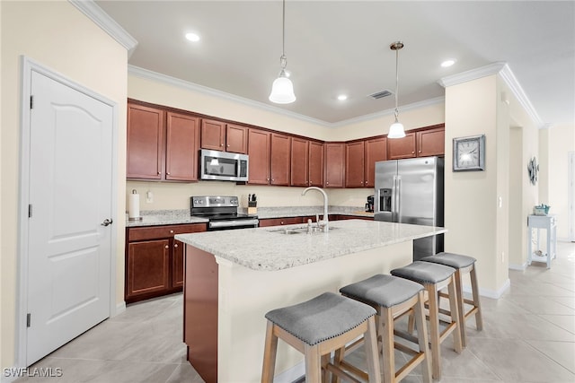 kitchen featuring stainless steel appliances, crown molding, a sink, and visible vents