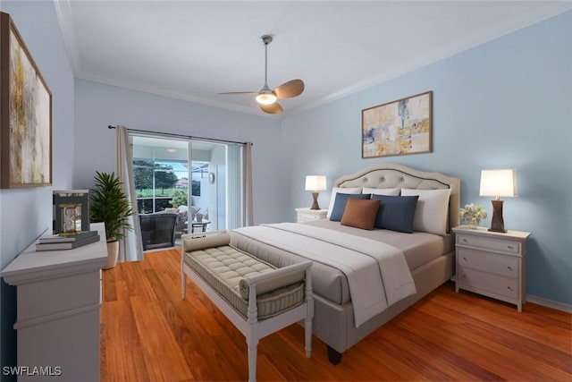 bedroom with ceiling fan, access to exterior, light wood-type flooring, and ornamental molding