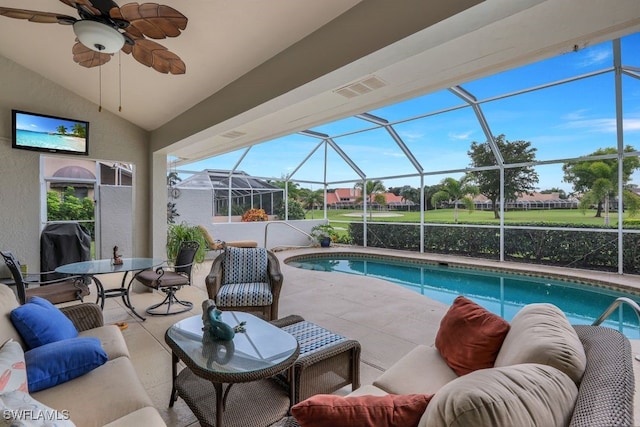 view of pool featuring an outdoor hangout area, a patio area, ceiling fan, and a lanai