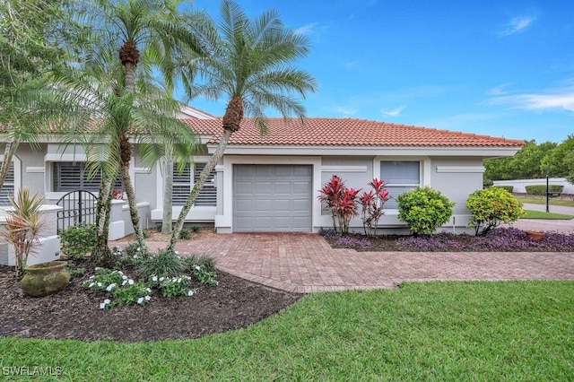 view of front of property with a garage