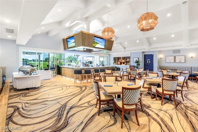 dining room featuring high vaulted ceiling, beam ceiling, recessed lighting, and visible vents