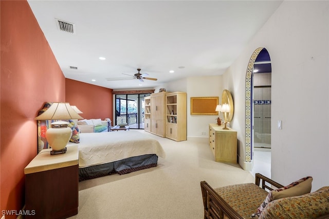 bedroom featuring ceiling fan and light carpet