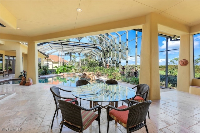 view of patio with a lanai