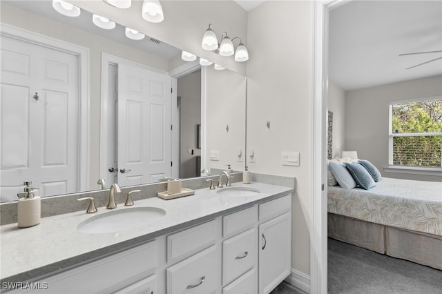 bathroom featuring ceiling fan and vanity