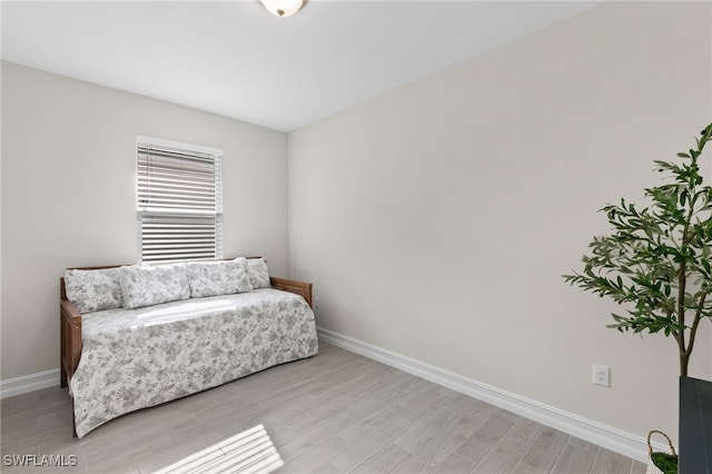 sitting room featuring light hardwood / wood-style flooring