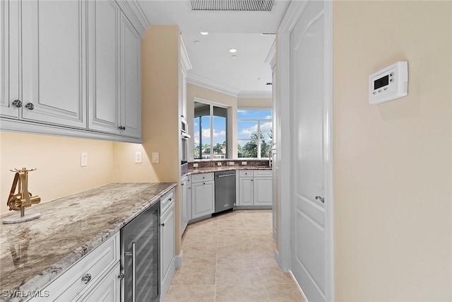 kitchen featuring light stone counters, beverage cooler, visible vents, recessed lighting, and ornamental molding