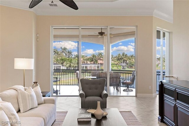 28551 Calabria Ct Unit 202, Naples, FL 34110 - living area with baseboards, ornamental molding, light tile patterned floors, a ceiling fan, and visible vents