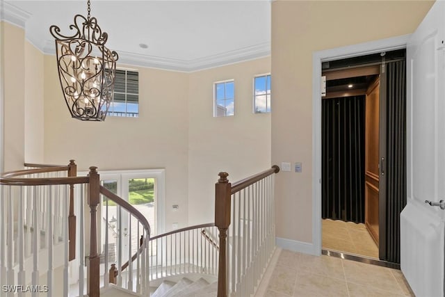28551 Calabria Ct Unit 202, Naples, FL 34110 - stairs featuring a chandelier, tile patterned floors, crown molding, and baseboards